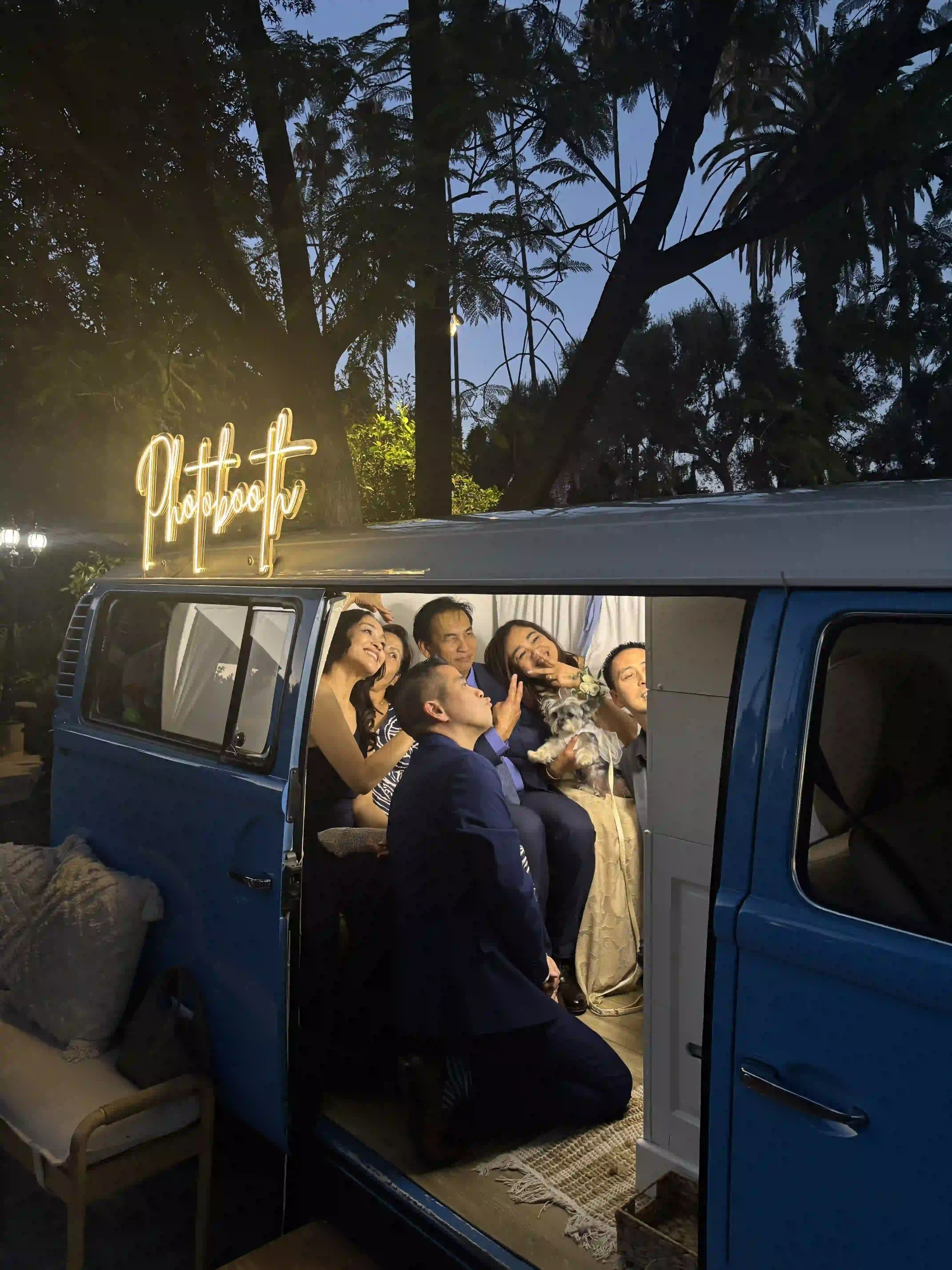 Wedding guests using photobooth in Rancho Cucamonga