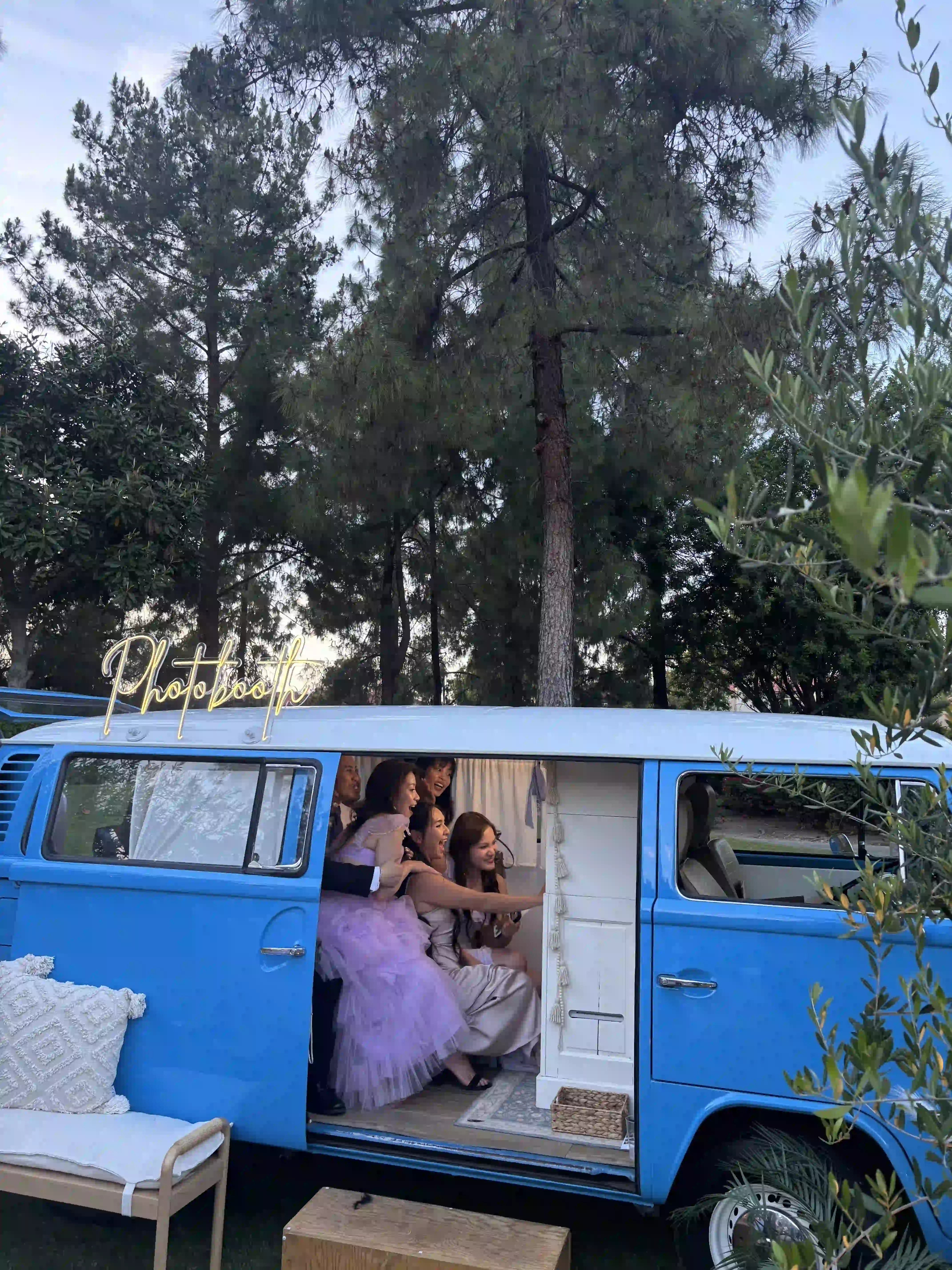Wedding photo booth fun in at golf course wedding venue