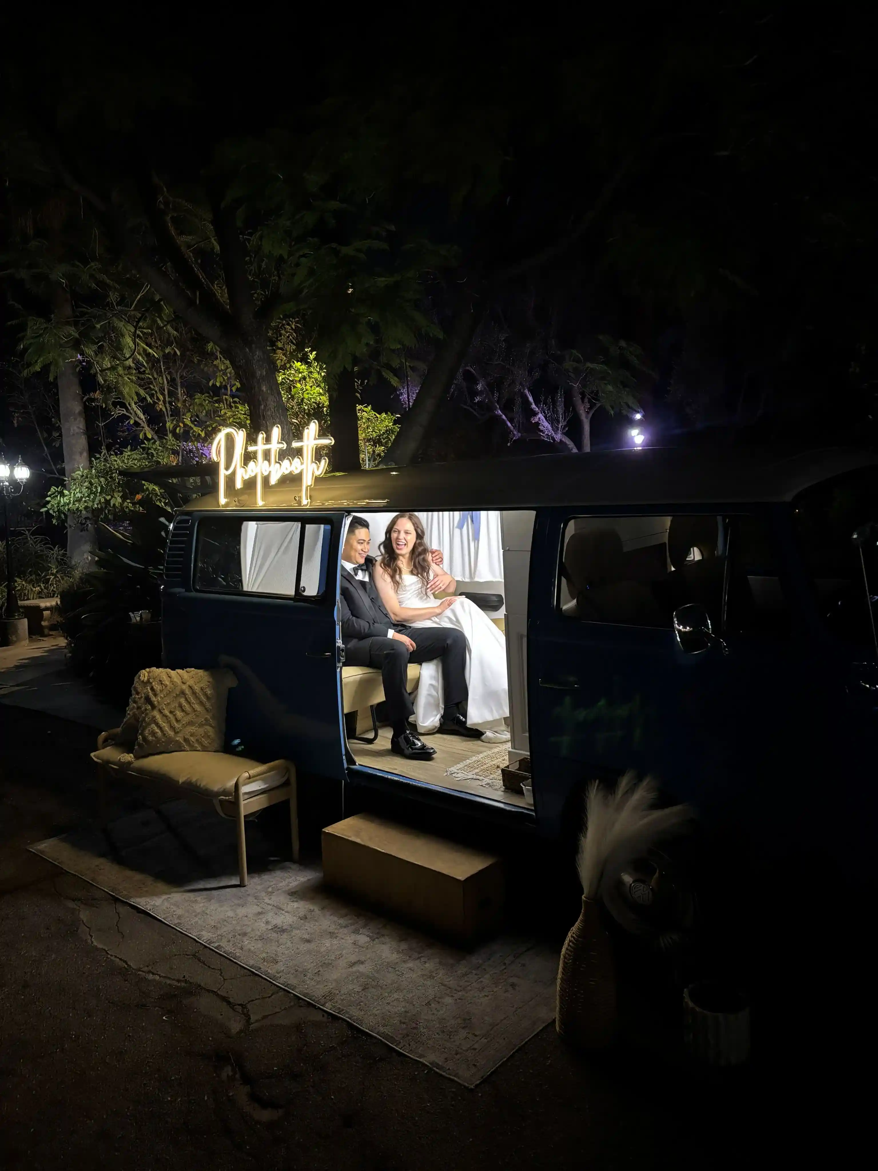 Bride and Groom inside VW Bus photo booth for wedding in Southern California
