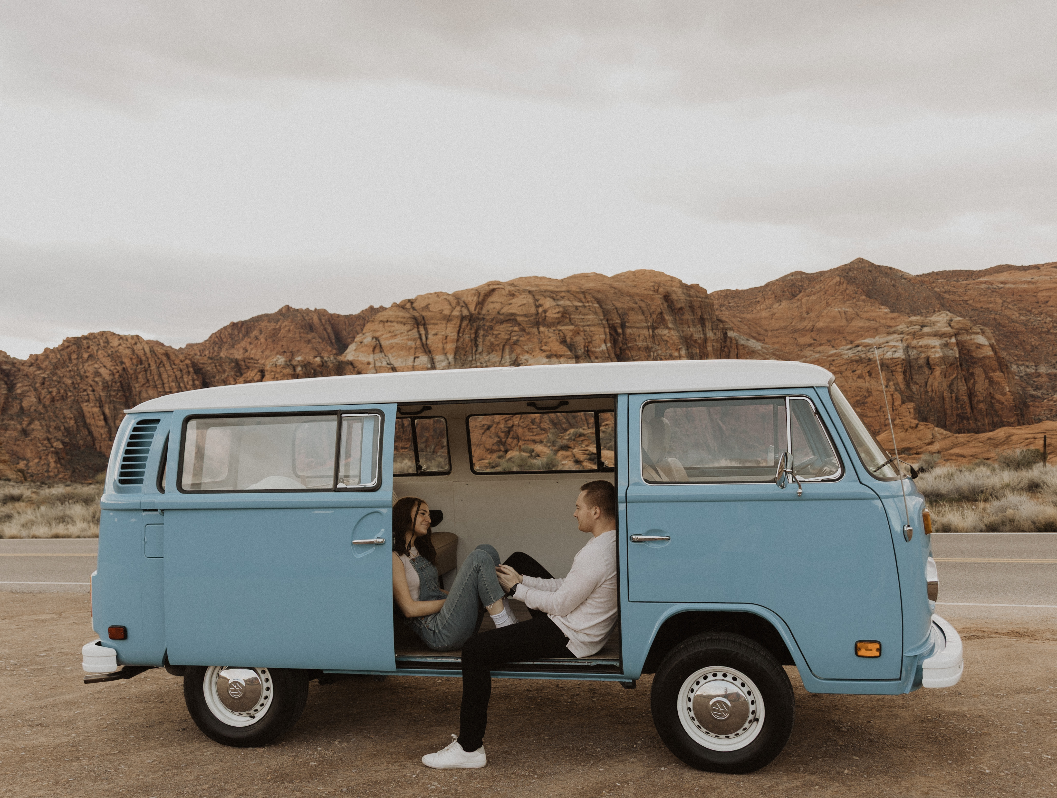 Friends taking pictures in the VW photo booth